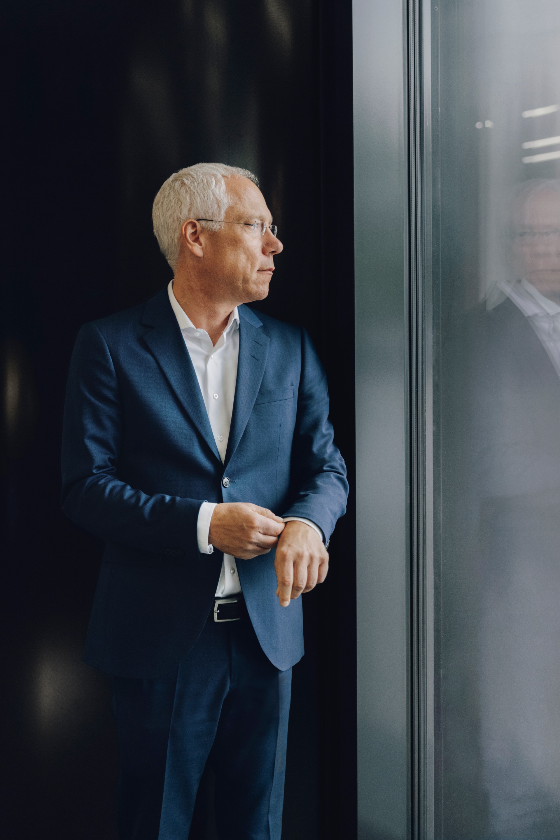 Peter Gladbach looking out of the window.