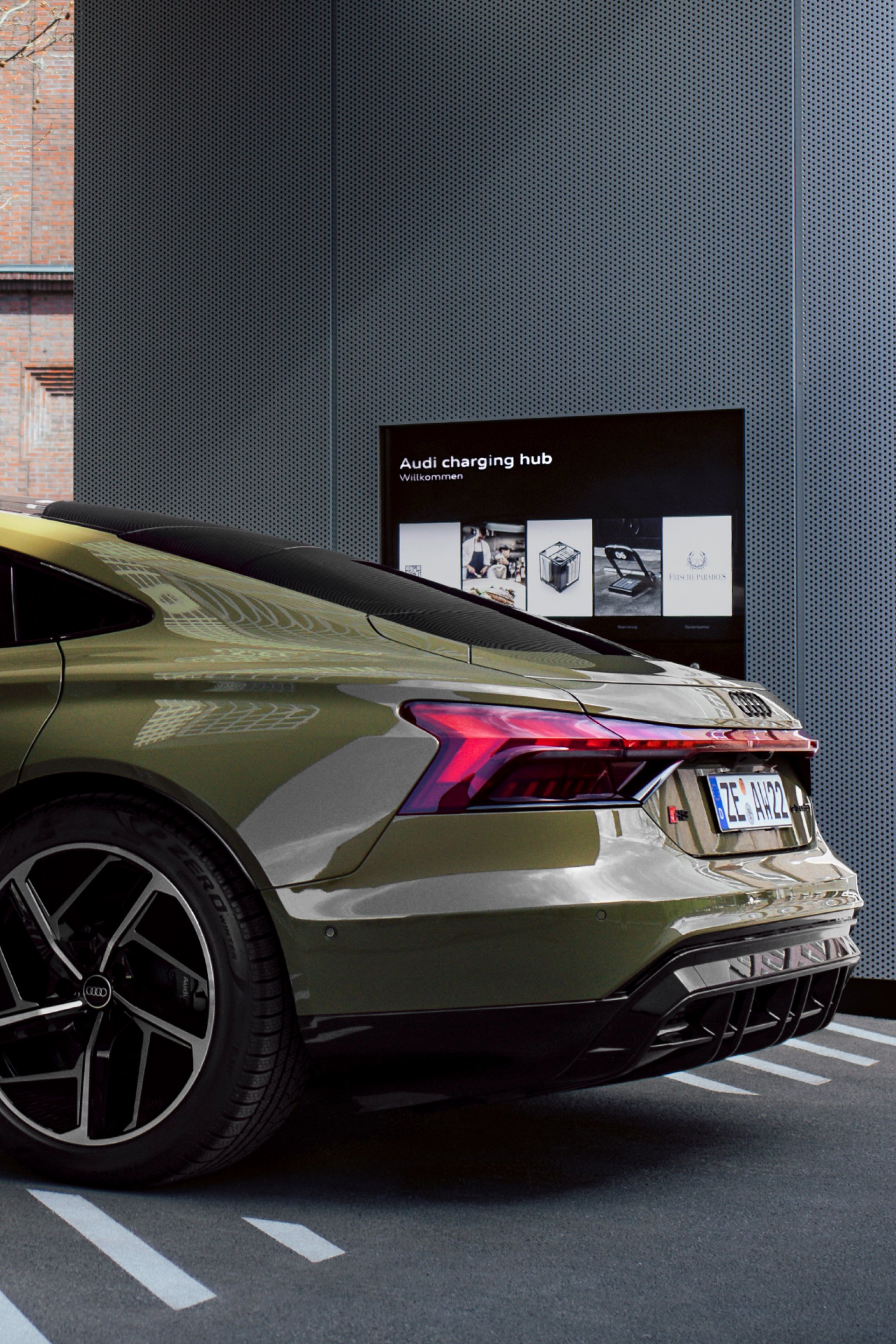 Rear of the Audi RS e-tron GT in the Audi charging hub.