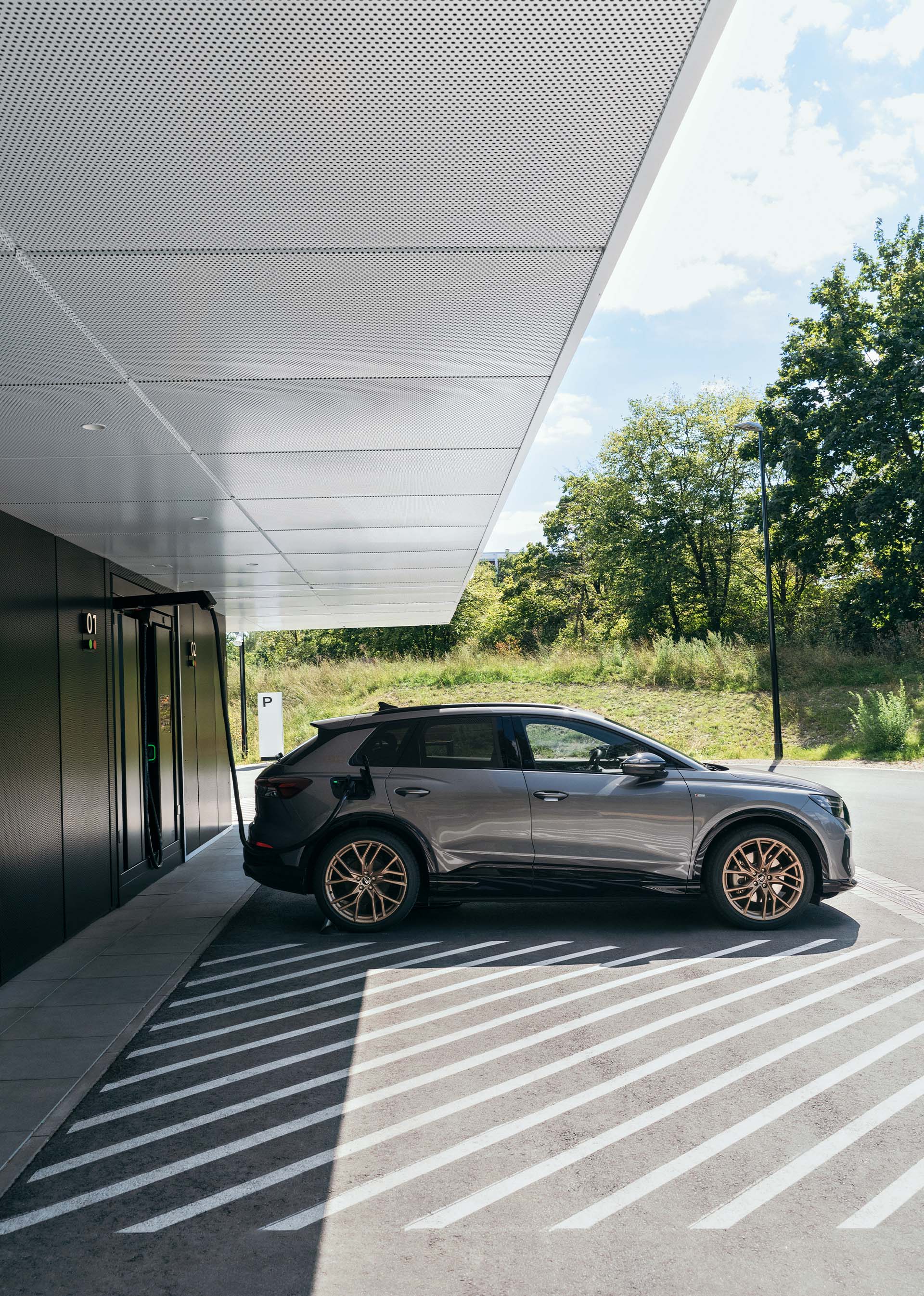 The Audi Q4 e-tron parked at one of the charging points at the Audi charging hub.