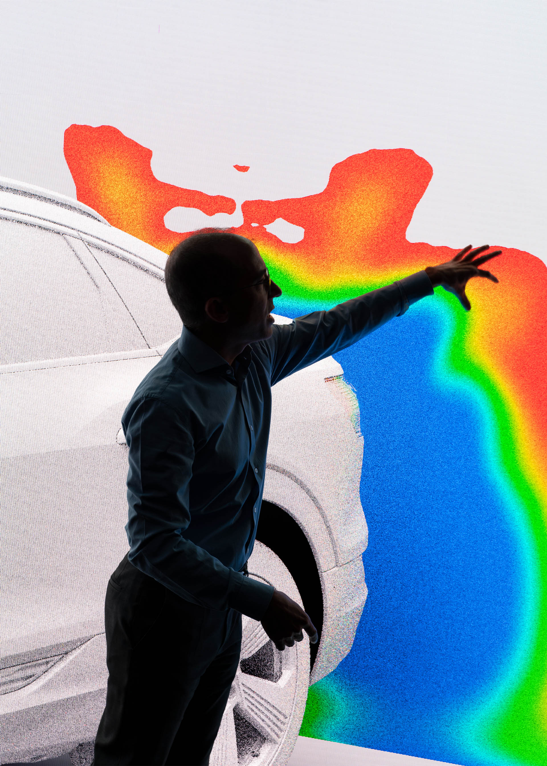 Dr. Moni Islam shows the overshoot at the rear of the vehicle.