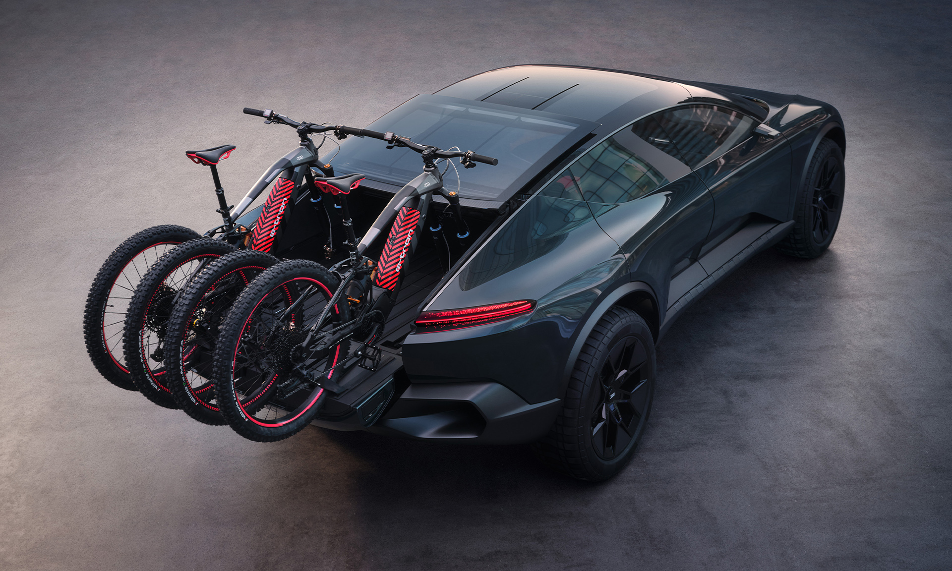 Two e-mountain bikes in the cargo bed.