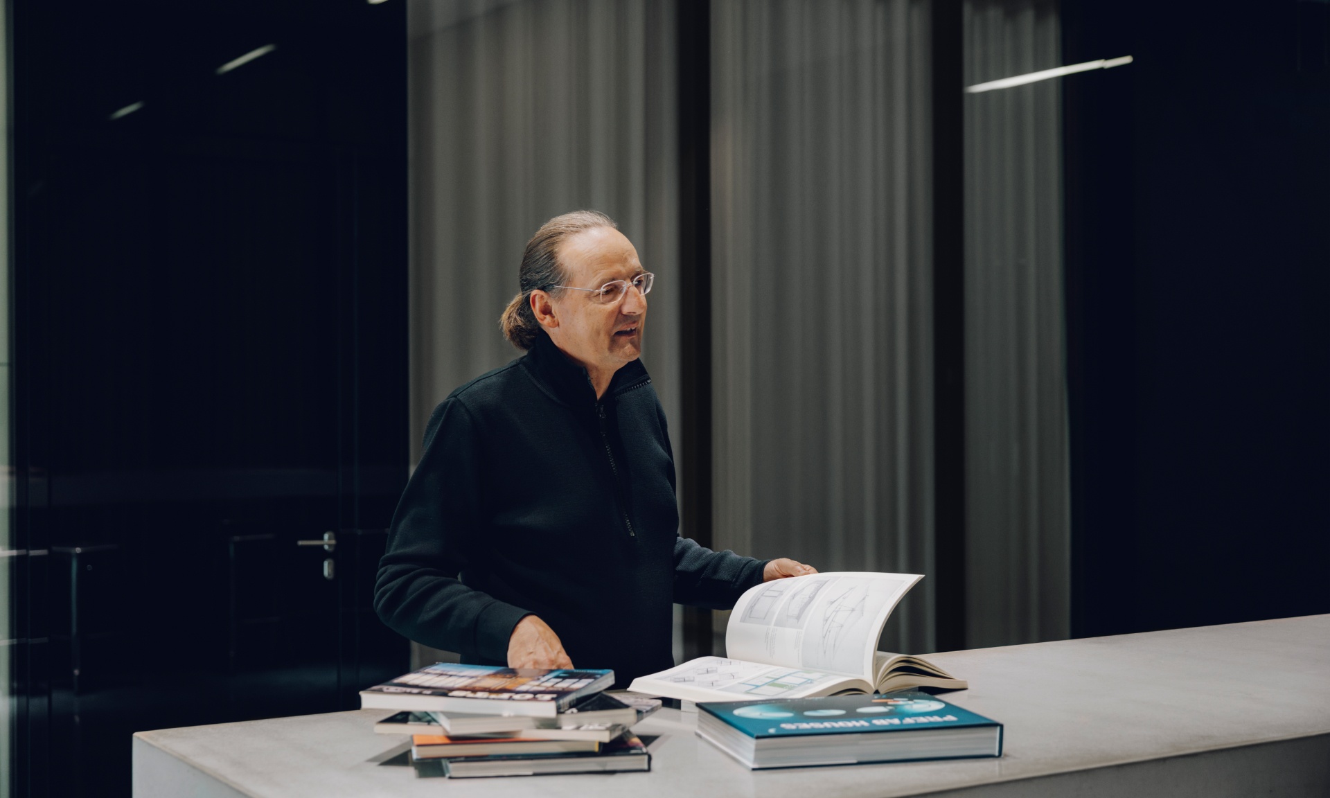 Potthoff sitting at a desk with books.