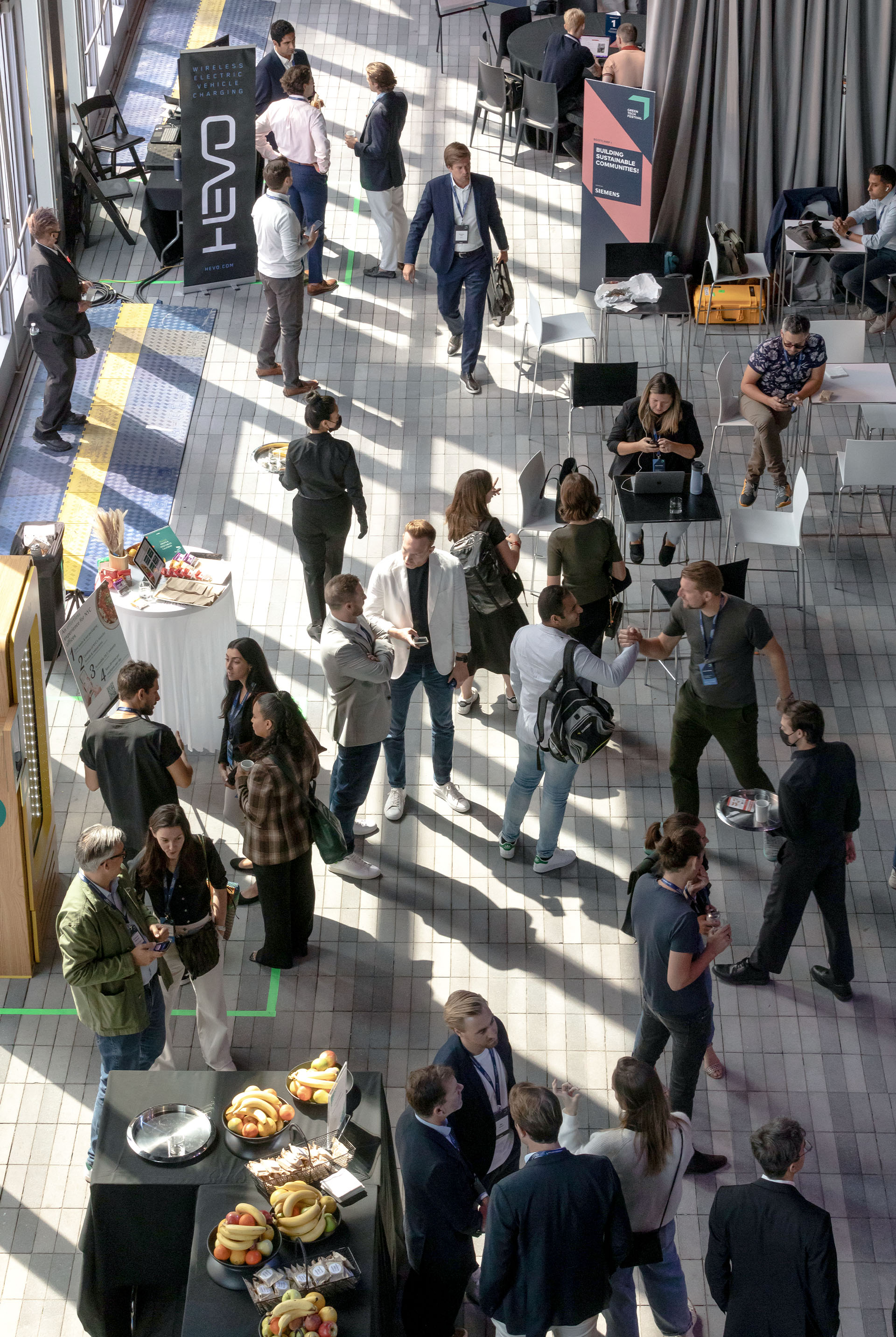 Visitors at the Greentech Festival can be seen in the event area.