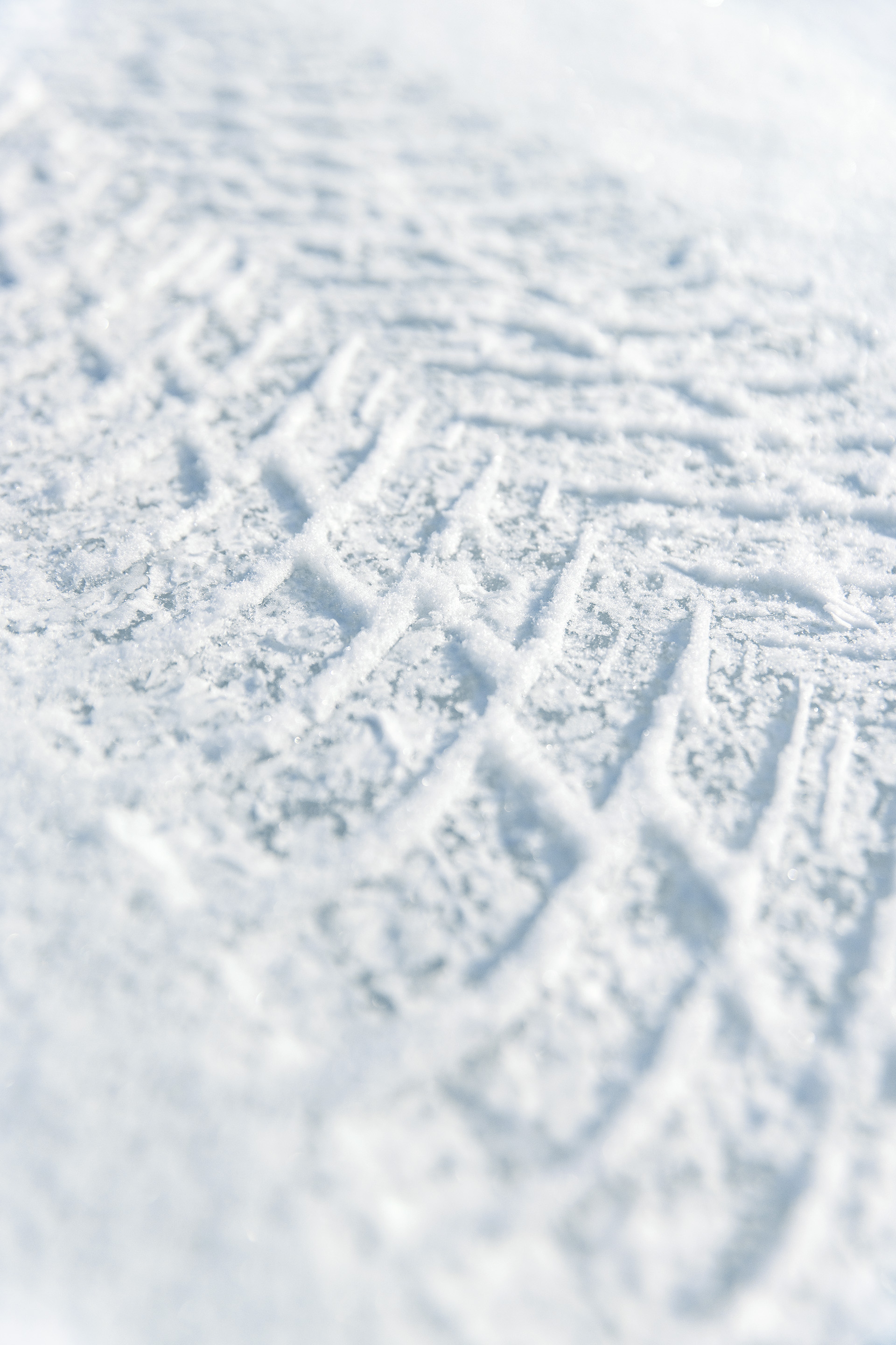 Tyre tracks in the snow.