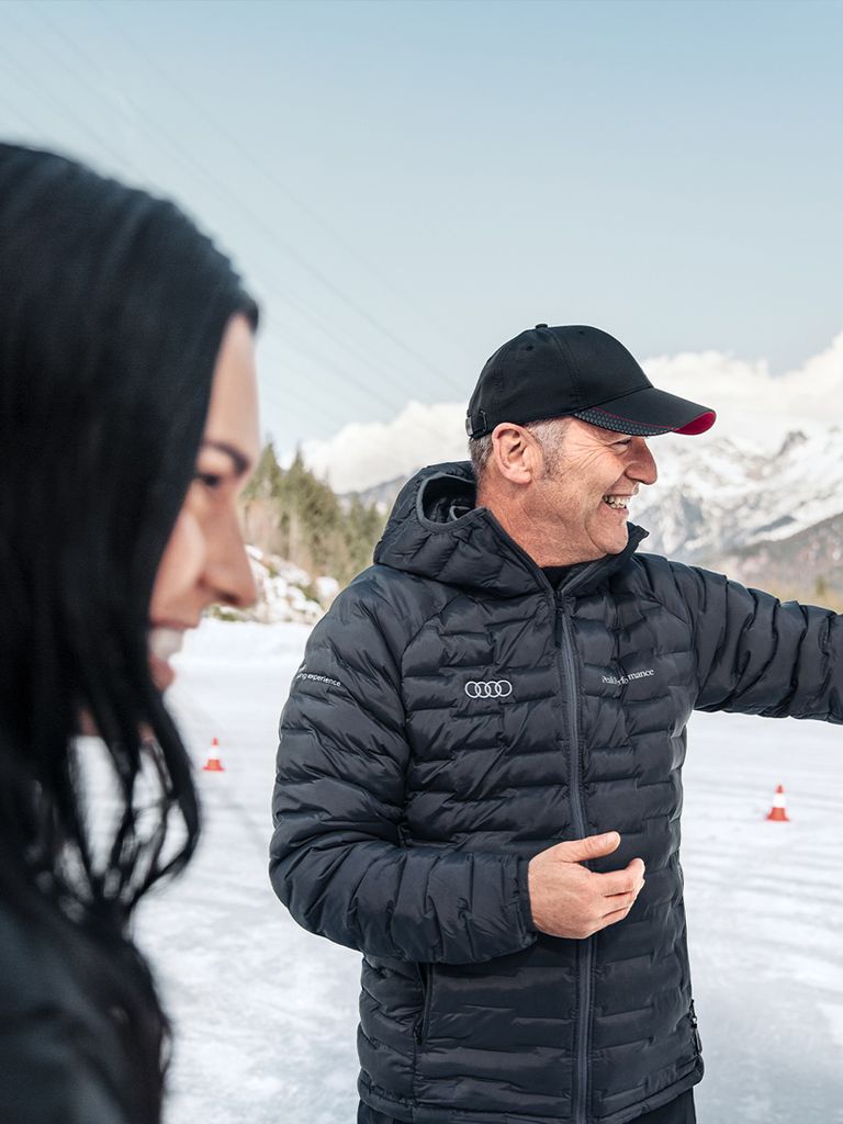 Instructor Stefan Eichhorner points something out to Anna Veith.