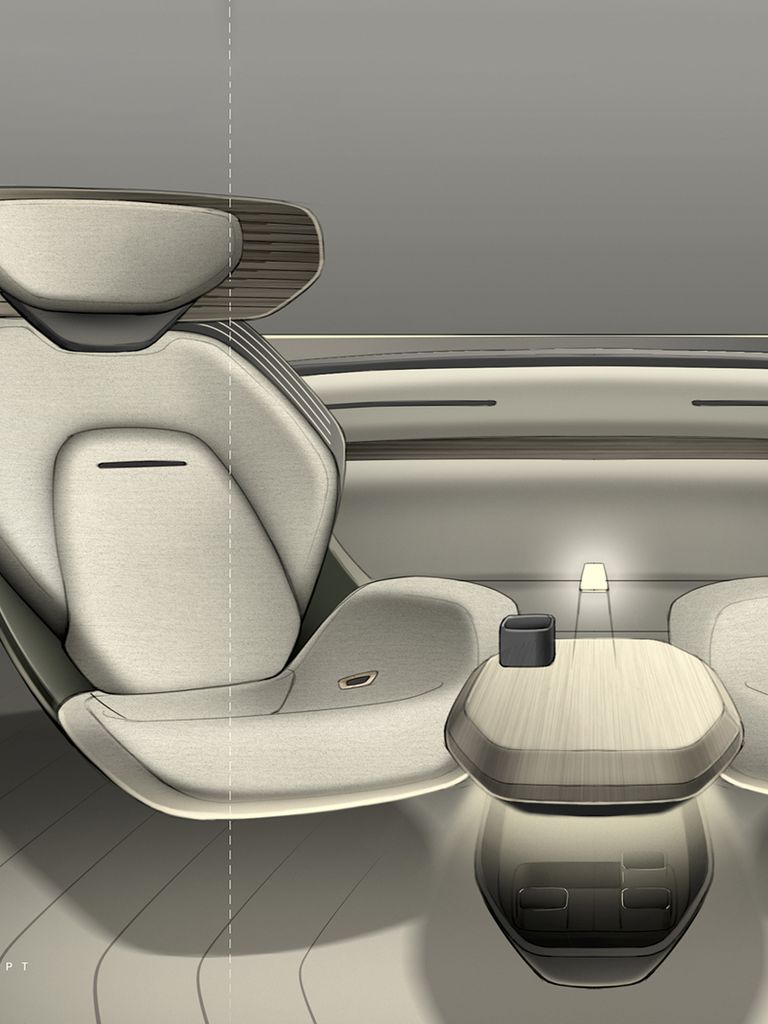 A sketch shows two car seats in the Audi urbansphere concept that are turned to face each other, with a table in between.