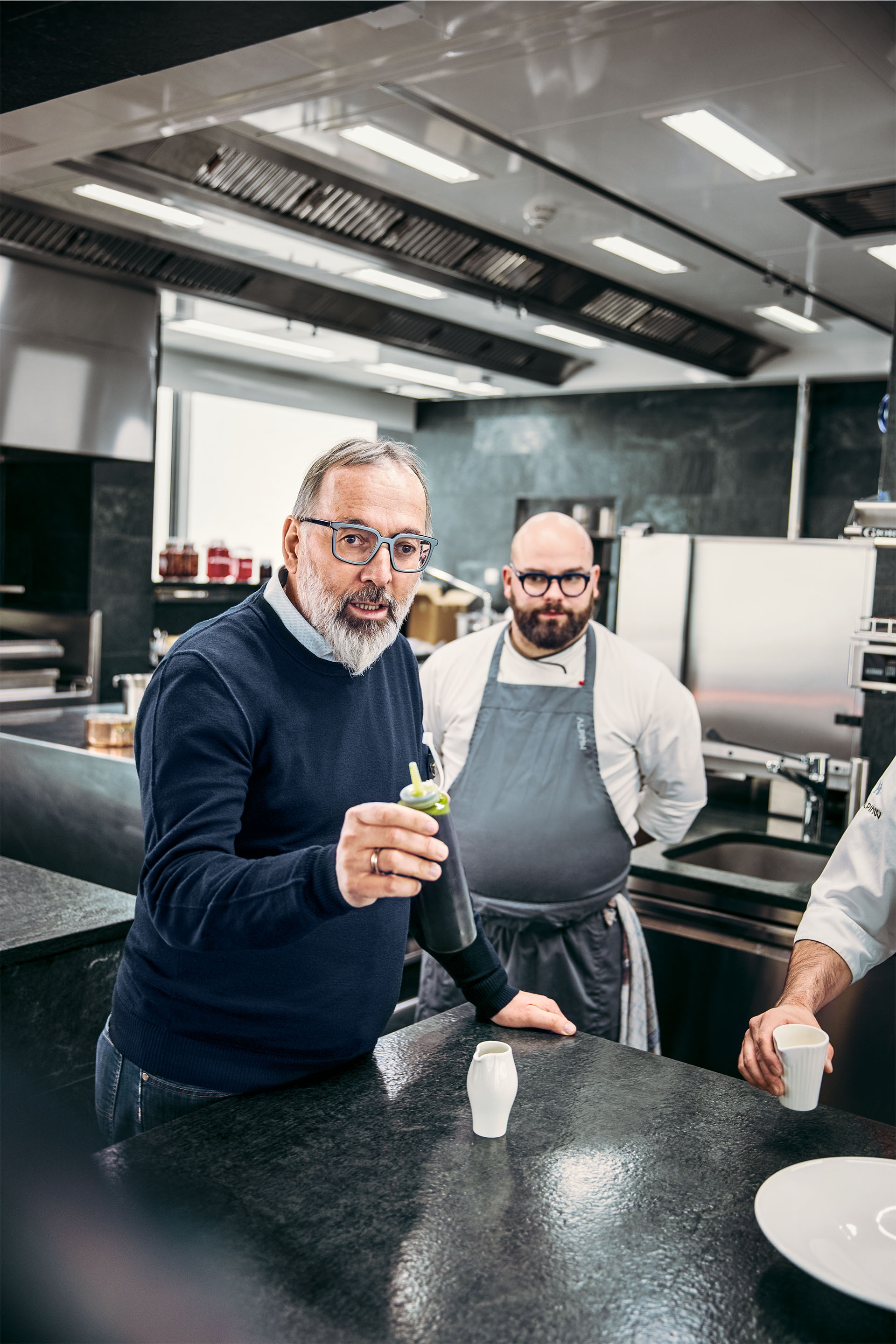 Norbert Niederkofler presents his soya sauce made from mountain lentils.