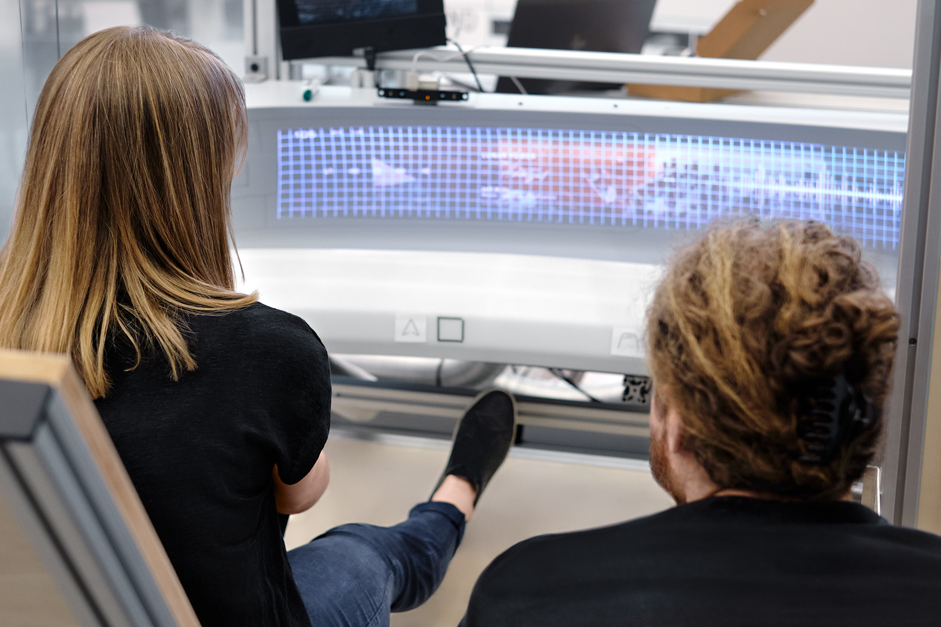 Projections playing across the Audi grandsphere concept’s{ft_concept-vehicle} front console.