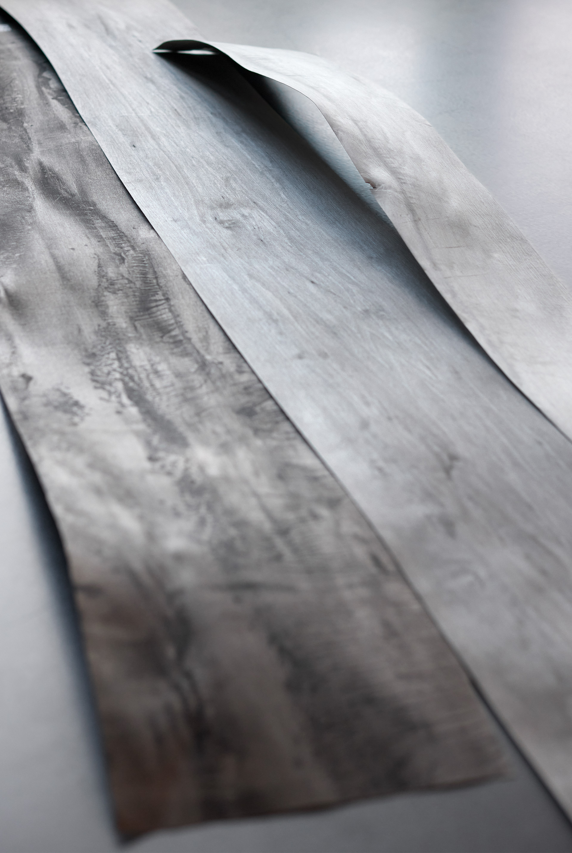 Wood samples lie on a table.