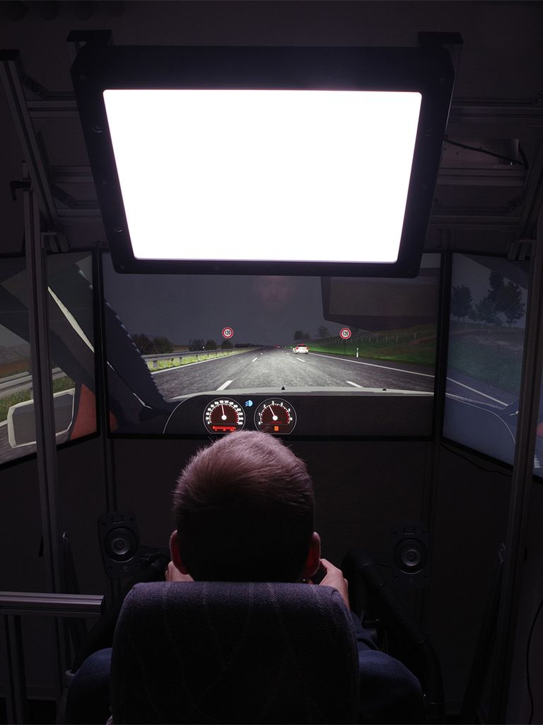 Person in driving simulator