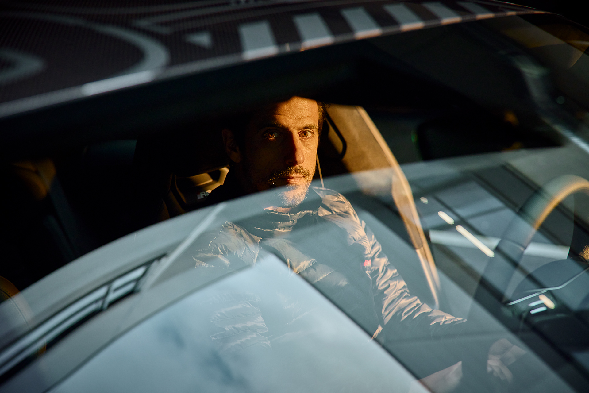 Looking through the windshield into the eyes of Lucas di Grassi.