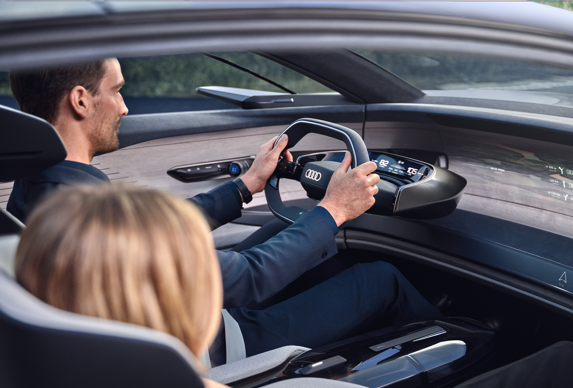 Passengers in the Audi grandsphere.