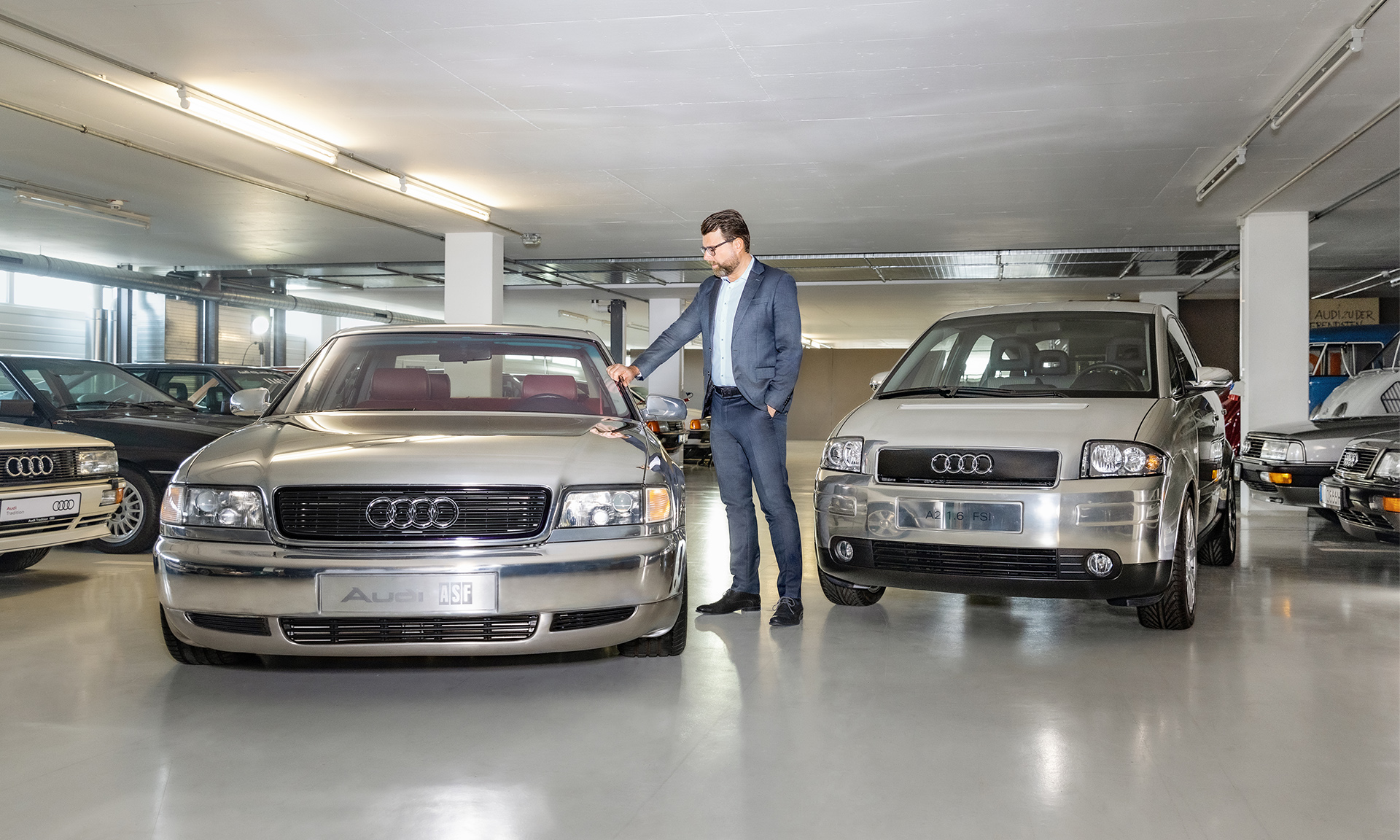 Oliver Hoffmann moves between two concept cars.