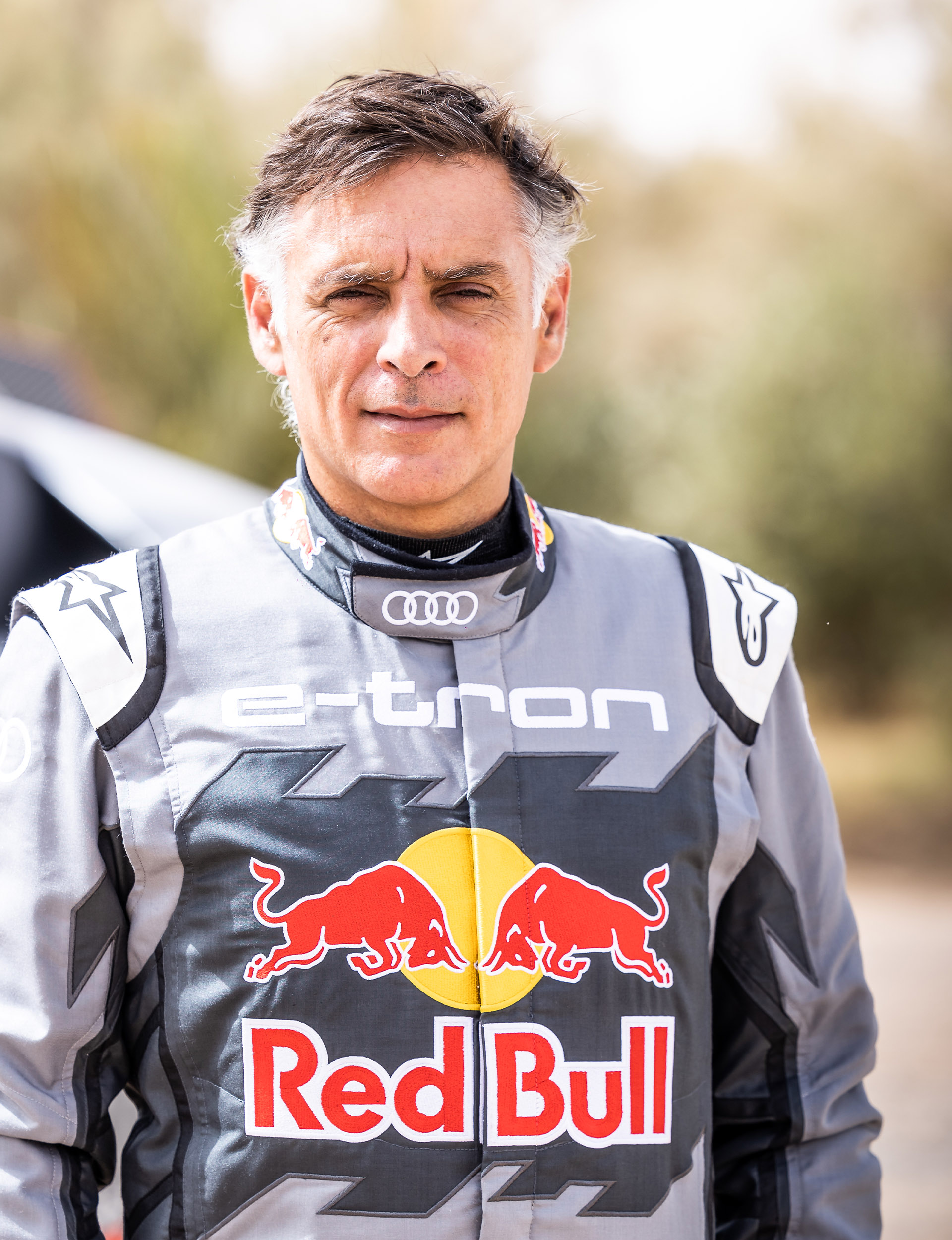 Portrait of Lucas Cruz in racing suit.